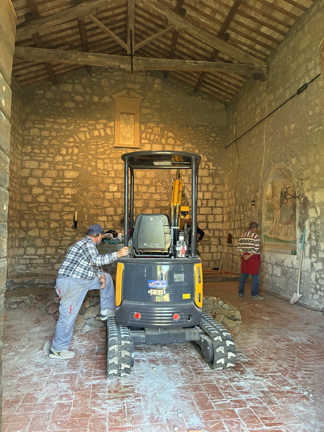 Renovation work under way inside an old stone building